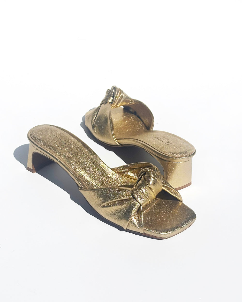 Knot gold sandals