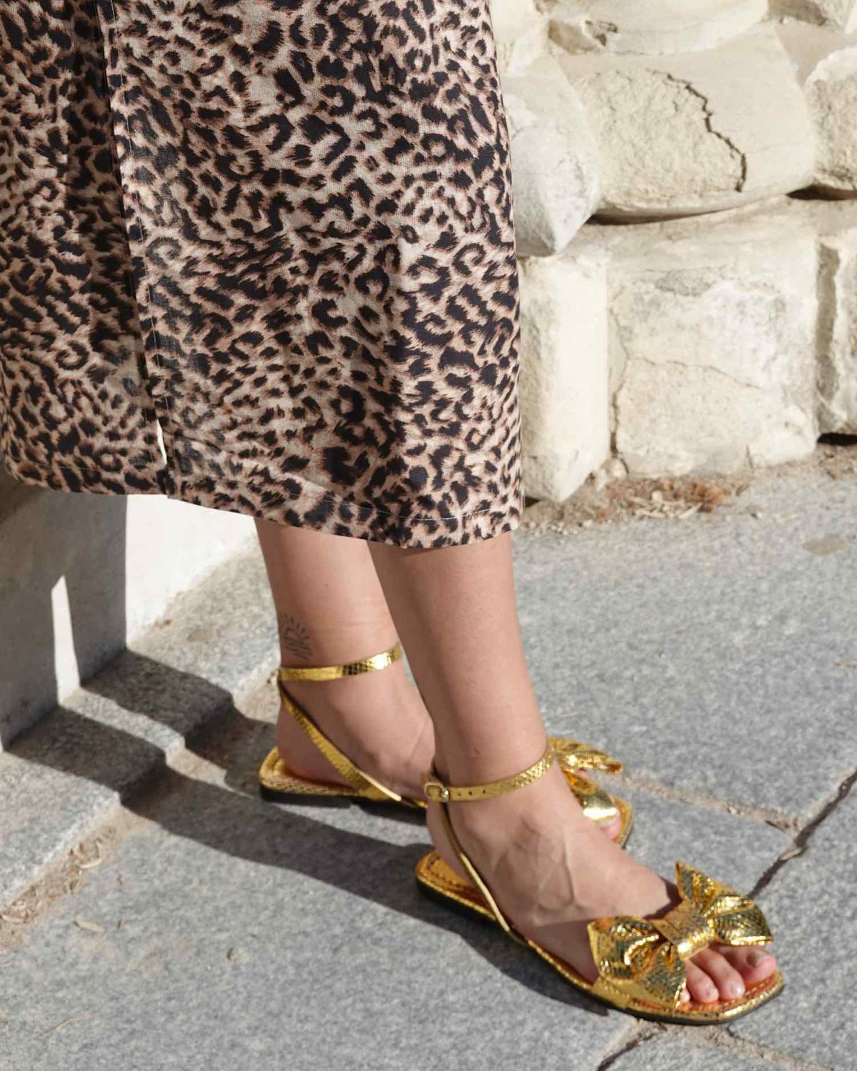 Bow gold sandals