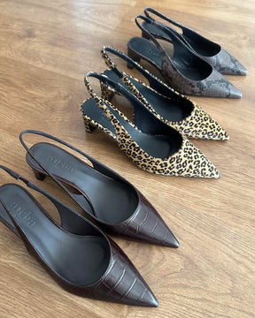 Zapatos destalonados Miss Snake de ADEBA con estampado de serpiente